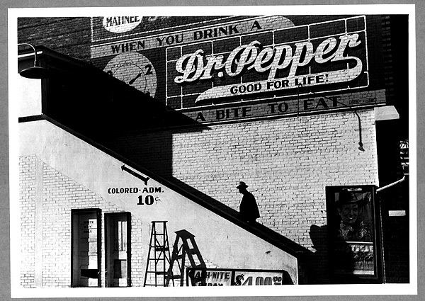 Negro man entering movie theater by "Colored entrance," Belzoni, Mississippi, 1939.