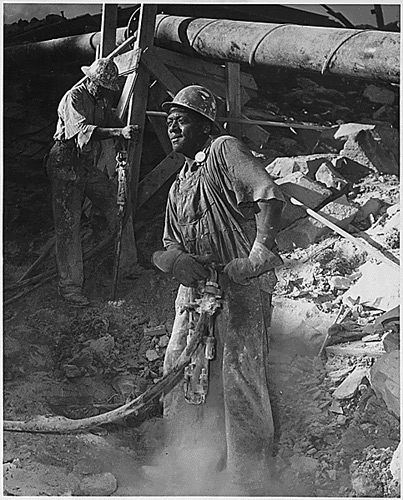 Black jackhammer operator at the Tennessee Valley Authority, June 1942.