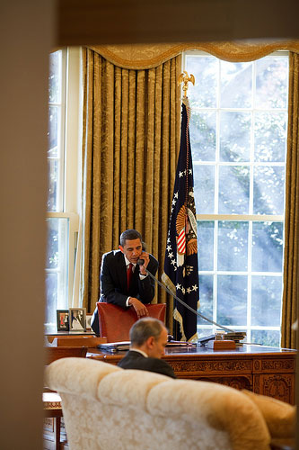 President Barack Obama calls Senators from the Oval Office.