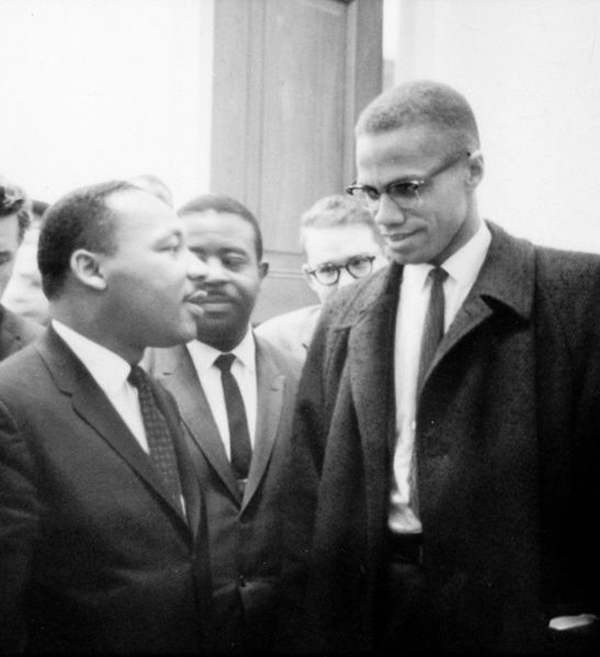 Martin Luther King, Jr. and Malcolm X meet during a Senate Debate on the Civil Rights Act of 1964.